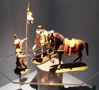 Figur mit Pferden